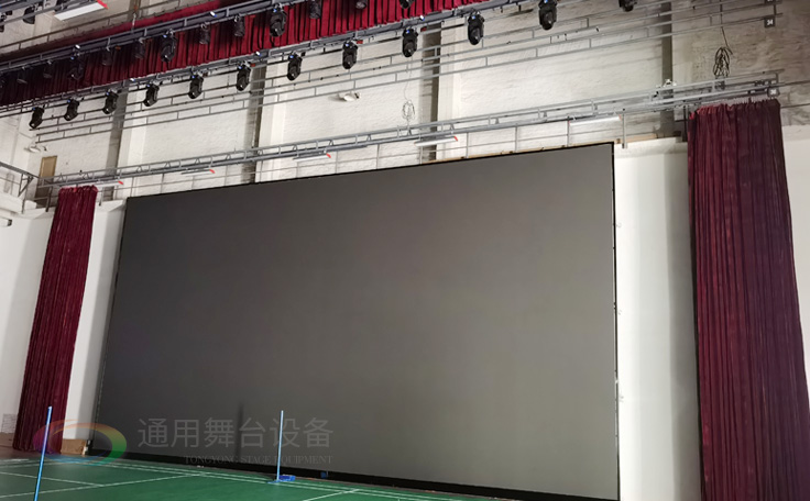 廣州黃花崗禮堂選擇通用舞臺！禮堂舞臺阻燃幕布、吊桿、舞臺燈光項目圓滿竣工！